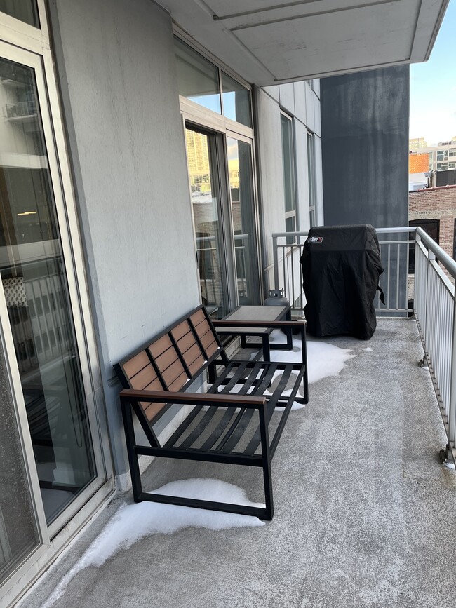 Huge balcony, grill may be left upon request. - 330 W GRAND Ave