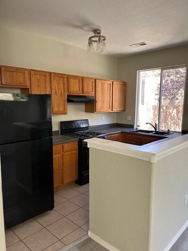 Kitchen - refrigerator, oven, dishwasher. - 6501 San Antonio Dr NE