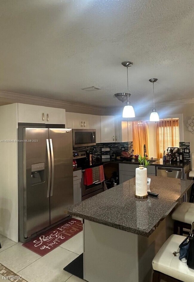 Foto del edificio - 4 br, 2 bath House - 8116 NW 74th Ave