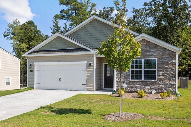 Foto del edificio - Beautifully designed 4-bedroom, 2-bath ranch