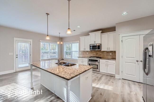 Foto del edificio - 5 br, 3 bath House - 2501 Wevok Way SE UNIT