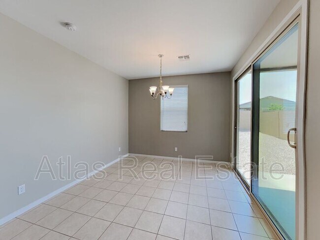 Building Photo - 40481 W Jenna Ln