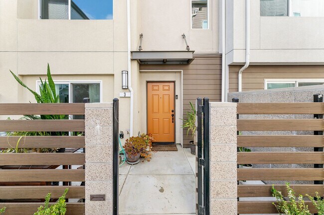 Building Photo - Modern Tri-Level Townhome in Gated Gardena Community with 2-Car Garag