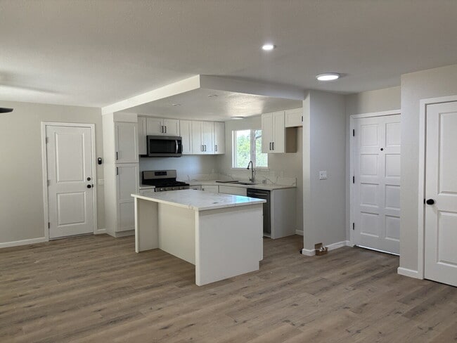 Building Photo - Fully remodeled home nestled on a spacious...