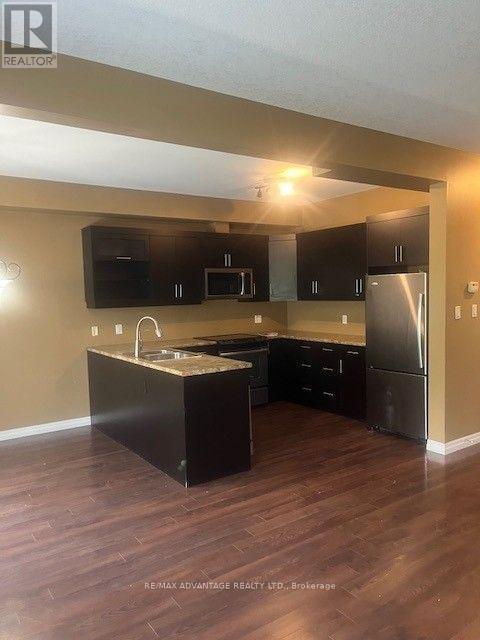 Photo du bâtiment - 112 N Centre Rd