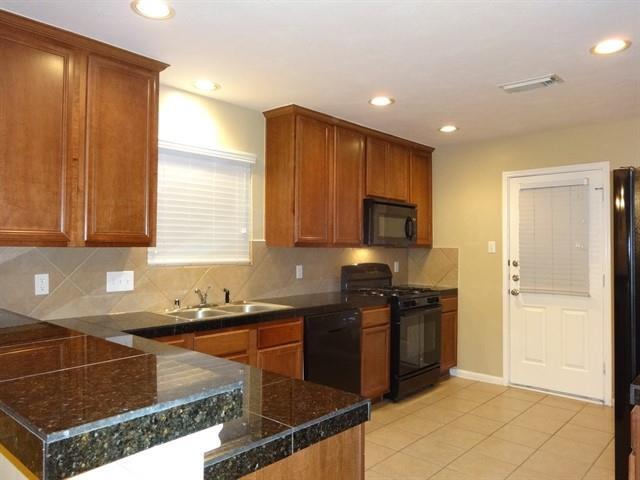 Foto del edificio - 8815 Windfern Trace Dr