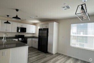 Building Photo - 3736 Enchanted Sky St