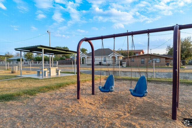 kids like the swings at Mundo Nuevo Park in Eagle Pass.