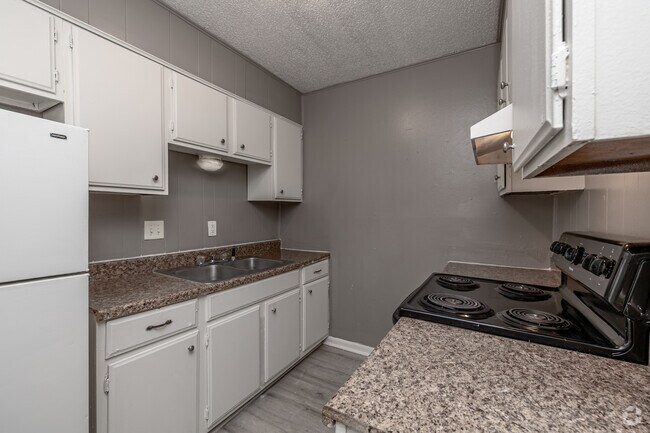 2 habitaciones, 1 baño - 854 pies cuadrados - Cocina - Sunset Village