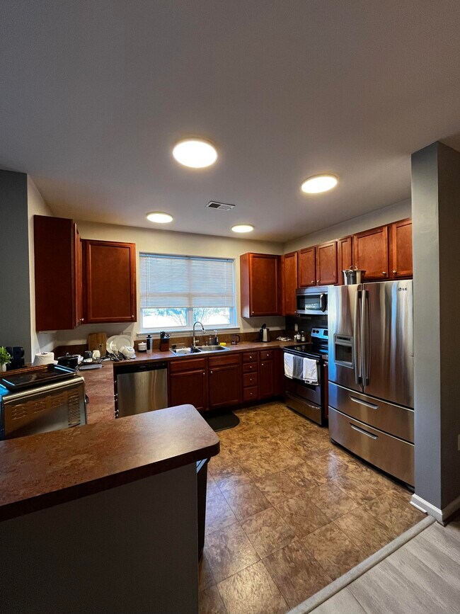 Building Photo - 5201 Nuthall Dr