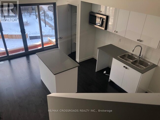Photo du bâtiment - 369-369 Essa Rd
