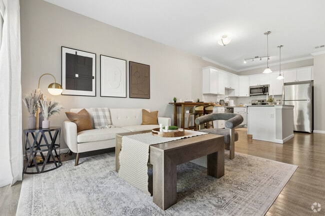 1BR, 1BA - 751SF - Living Room and Kitchen - Covered Bridge