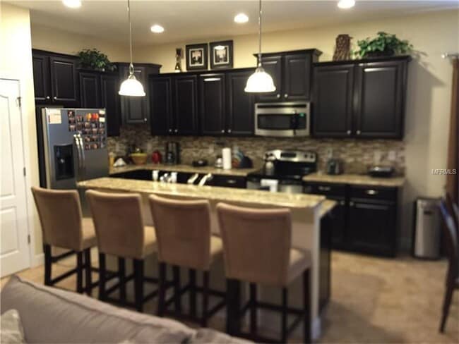 Foto del edificio - GORGEOUS SINGLE FAMILY HOME, PROFESSIONALLY DECORATED, FULLY FURNISHED