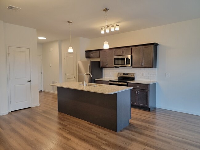 Madison Floor Plan - Kitchen (Wood Cabinets) - Red Mill Crossings