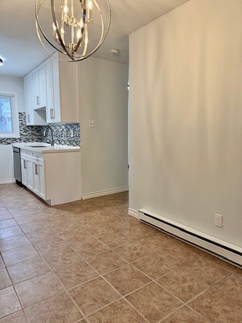 Building Photo - Westmount Townhome!   3 Bedroom * Finished Bsmt  * Patio Fenced * AVAIL NOW