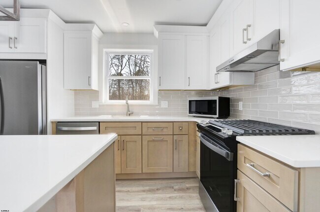 Foto del edificio - 6007 W Jersey Ave
