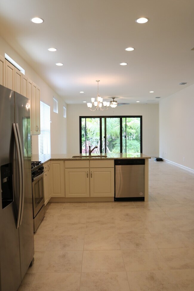 Building Photo - ** Venetian Point Villa ~ 2+Den ~ 2 Car Ga...