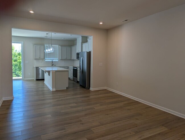Building Photo - Elegant, Move In ready townhome located in...