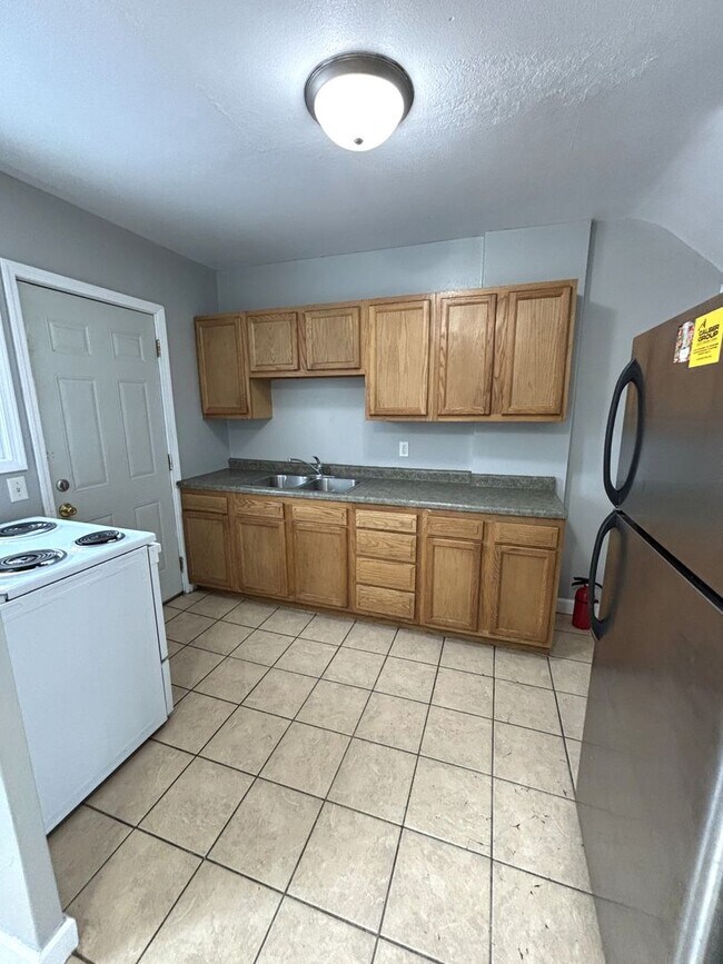 Building Photo - 1242 W Mullan Ave