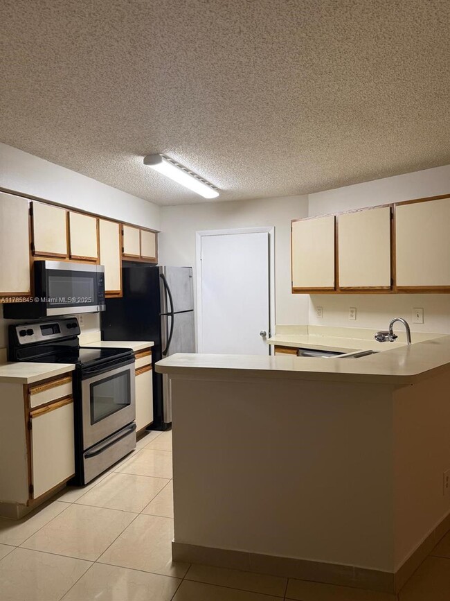 Foto del edificio - 9999 Summerbreeze Dr
