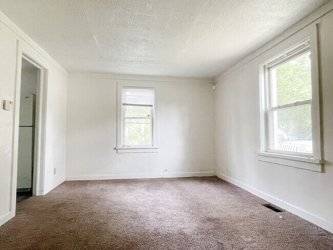 Building Photo - Large Backyard with Garage