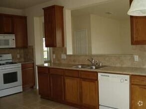 Building Photo - 7415 Oakwood Canyon Dr