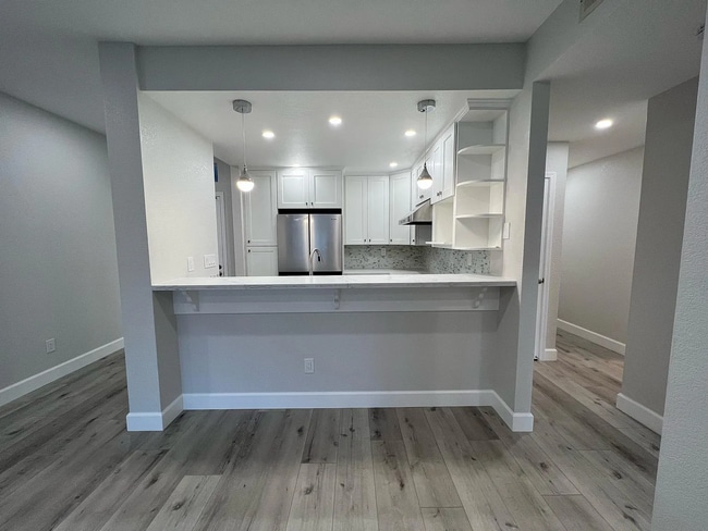 Building Photo - Completely renovated New hardwood floors.