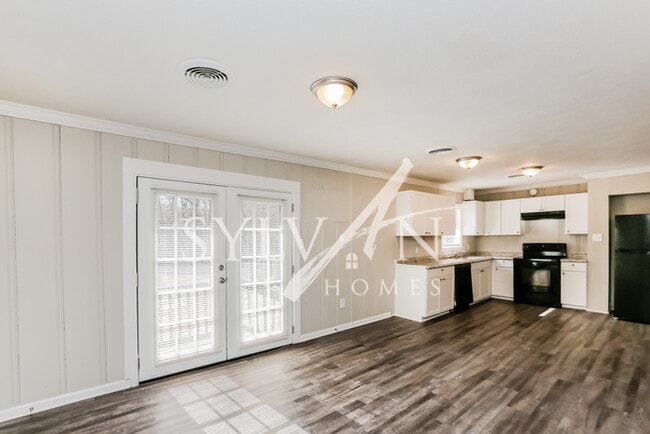 Building Photo - The living is easy in this 3 bedroom, 2 ba...