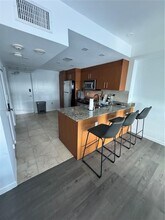 Building Photo - 10275 Collins Ave