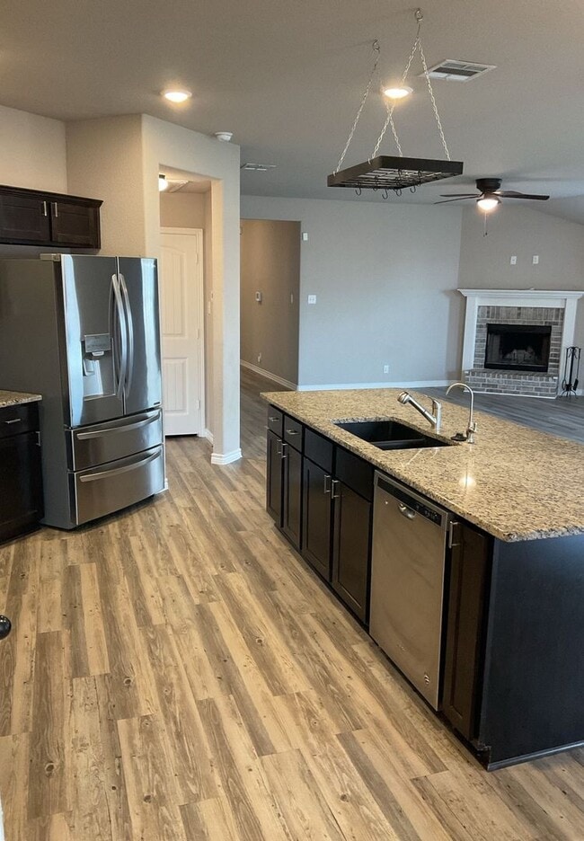 Building Photo - NEW IN MANAGEMENT - AVAILABLE NOW!