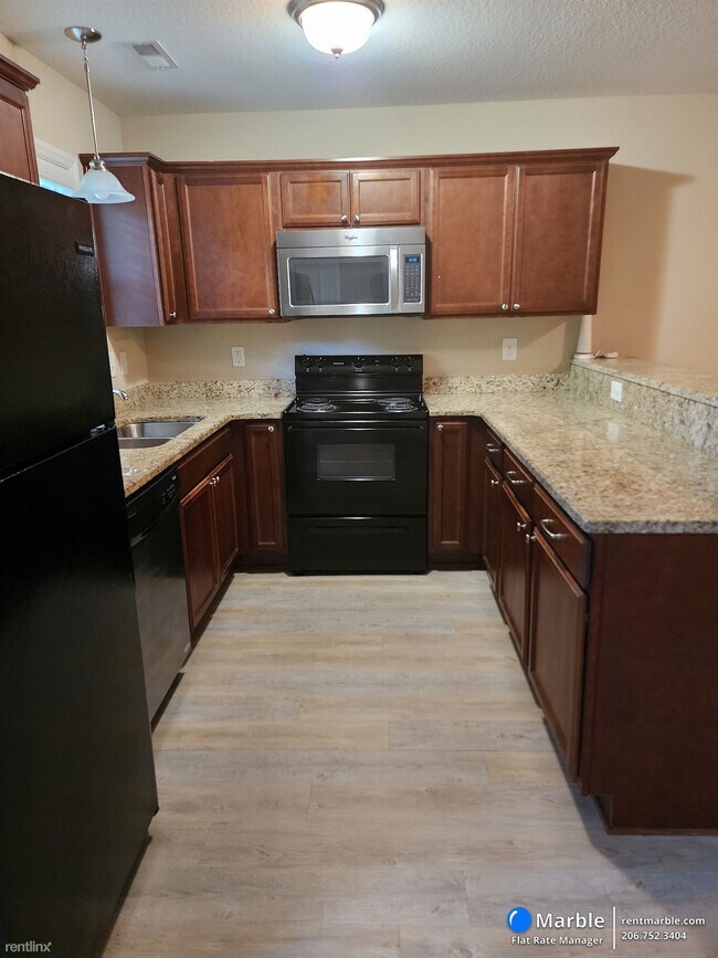Foto del edificio - 3 br, 2 bath Townhome - 1004 Spring Forest...