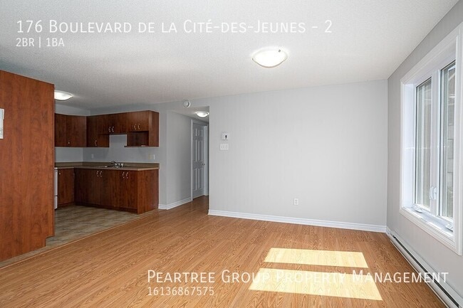 Photo du bâtiment - Charming 2 Bedroom End Unit Condo