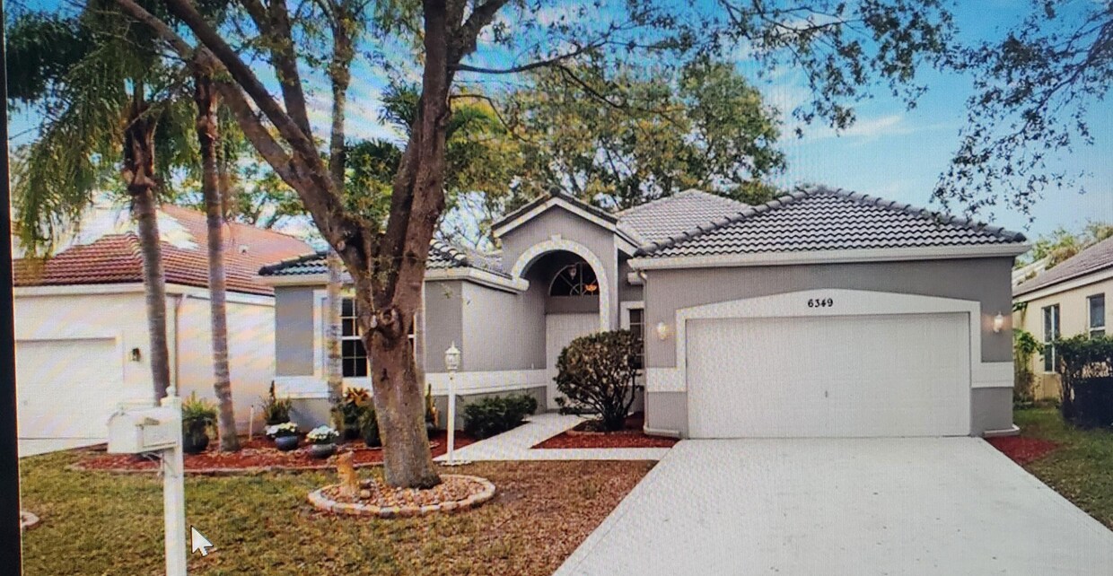 Photo - 6349 Northwest 78th Drive, Parkland, FL 33067 - 4 BR 2.5 BA Single-Family Home