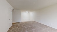 Located at 601 W Santa Fe Ave in Placentia, CA, this single-story, 3-bedroom, 2-bathroom home offers a functional and straightforward layout across its single floor. The living areas feature neutral-toned carpet throughout, creating a cohesive and comfortable feel. Textured ceilings and ceiling fans add character to the main living spaces, while white walls provide a clean, bright backdrop throughout the home. The kitchen is outfitted with warm oak wood cabinetry offering ample upper and lower storage, white countertops, a double stainless steel sink, and tile flooring. It opens into a combined dining area, also featuring a ceiling fan and tile flooring, making it ideal for everyday meals. Each of the three bedrooms is carpeted and features sliding closet doors with built-in shelving and hanging rods for organized storage. The primary bedroom is generously sized and includes a large window with vertical blinds, allowing for natural light and outdoor views. Both bathrooms are finished with tile flooring, wood-toned vanities with white countertops, and full tub-shower combinations, maintaining a clean and practical aesthetic throughout. Hallways connect each area of the home efficiently, completing this well-organized single-level floor plan.