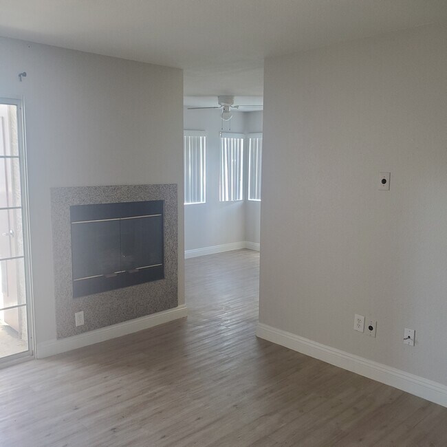 Living Room looking to Dining Room - 6500 W Lake Mead Blvd
