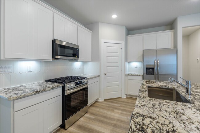 Foto del edificio - 8626 Blueberry Ash St