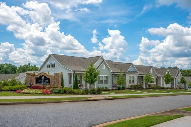 Exterior view highlighting the propertys entrance. - Cottages at Ridge Pointe