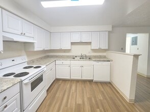 Building Photo - 5100 W 8th Ave