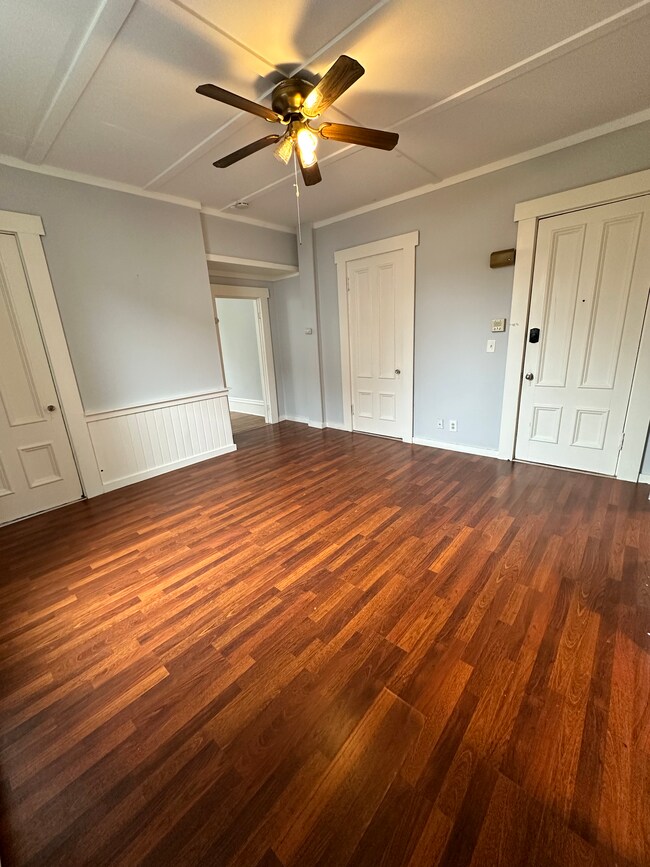 Living room also has a ceiling fan and 2 closets. - 7 Maple Ave