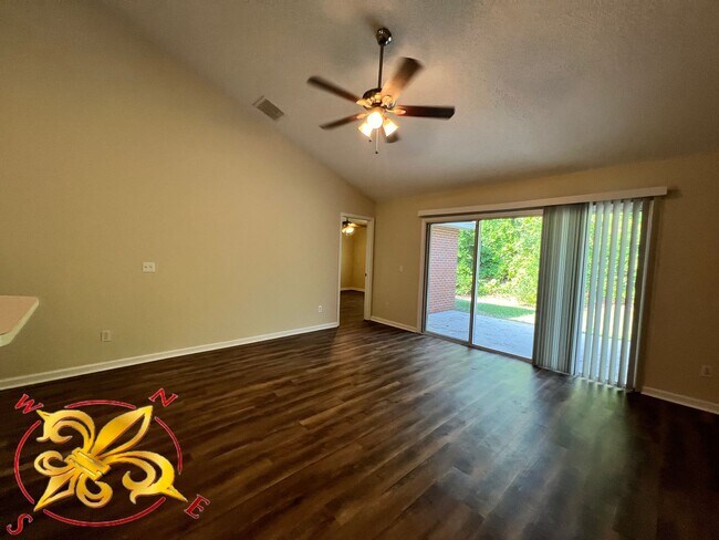 Building Photo - Charming 3-Bedroom Home with Garage – Lawn...