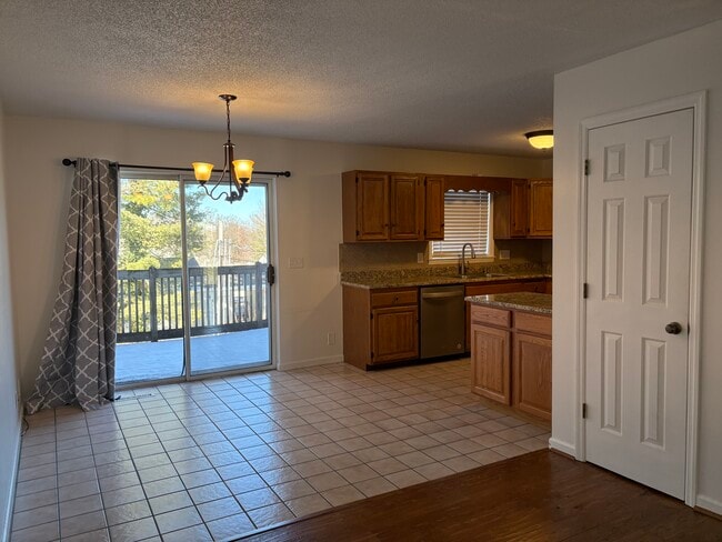 kitchen and dining area - 1410 Skyline Dr