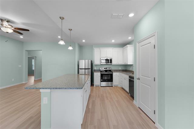 Building Photo - 2027 Bluebonnet Ave