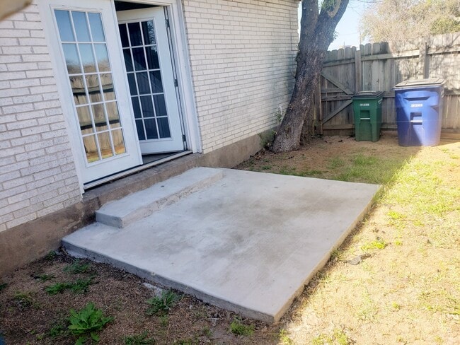 Private backyard with new cement patio - 2405 Mission Hill Dr