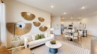 Located at 7950 Park Blvd N in Pinellas Park, Florida, this thoughtfully designed 2-bedroom, 2-bathroom single-floor residence offers a cohesive blend of modern finishes and comfortable living spaces. Light wood-style flooring flows throughout, unifying the open-concept layout.

The combined kitchen and living area serves as the heart of the home. The kitchen features white shaker cabinetry, granite countertops, stainless steel appliances, a subway tile backsplash, and a large island with pendant lighting — ideal for both cooking and casual dining. The living room is bright and airy, benefiting from large windows and a glass door that opens to a private balcony, allowing abundant natural light.

The spacious primary bedroom offers generous proportions, natural light through dual windows, and direct access to a well-appointed bathroom featuring a double-sink vanity with granite counters and light wood-style flooring. The second bedroom is equally inviting, with multiple windows and neutral tones. The second bathroom includes a full tub-shower combination with white tile surround and a granite-topped vanity. Each bedroom is complemented by a dedicated closet. A hallway connects all rooms, contributing to a functional and well-organized floor plan.