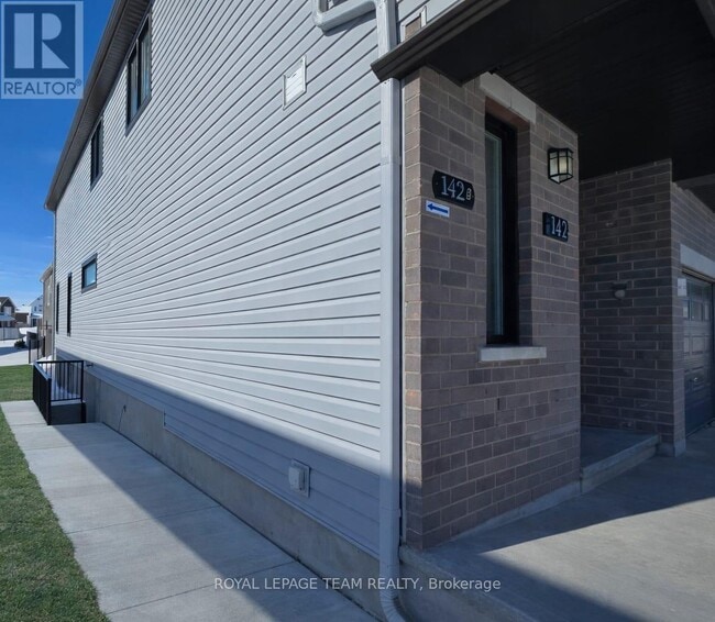 Photo du bâtiment - 142 Lumen Pl