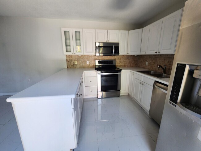 Foto del edificio - 5768 SE Windsong Ln