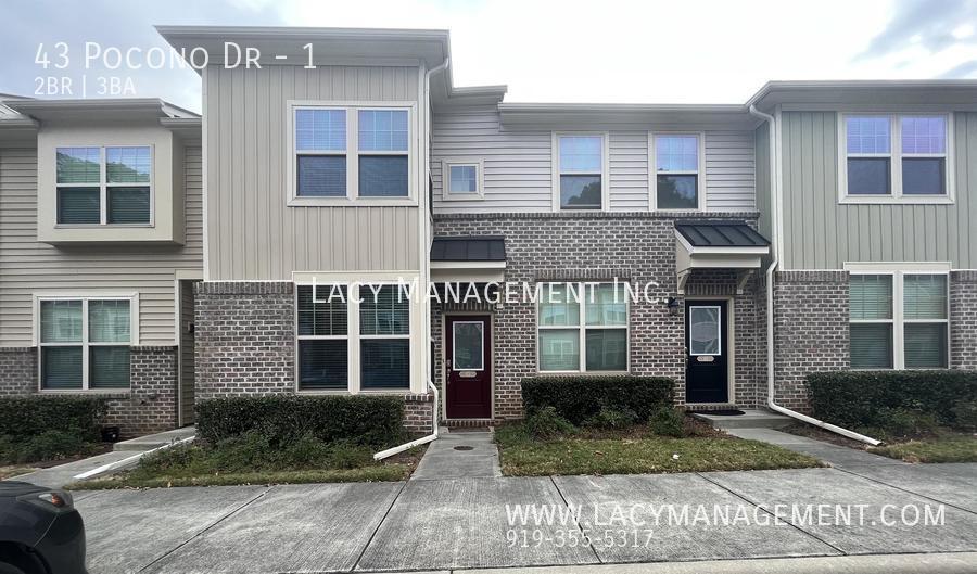 Primary Photo - A Townhome Equipped with Modern Appliances