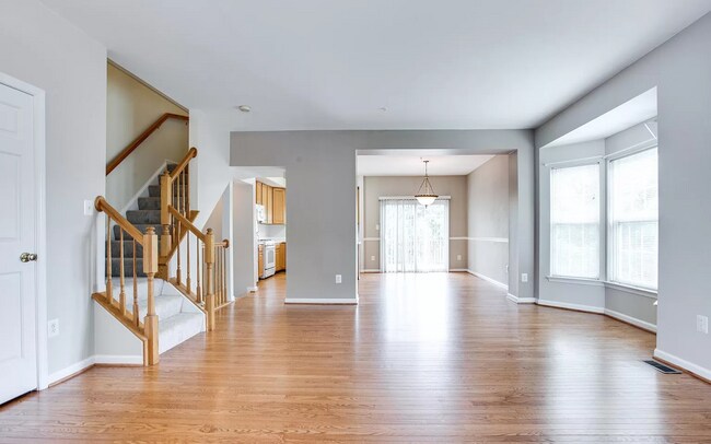 Open living room and dining area - 9443 Birchwood Ln
