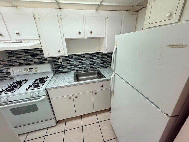 Building Photo - 1300 W 47th Pl