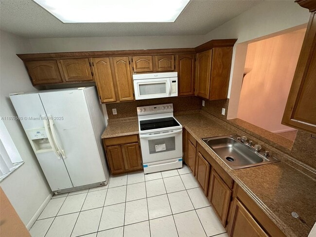 Building Photo - 8560 N Sherman Cir